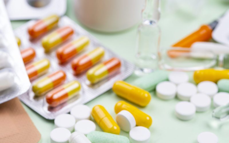arrangement-medical-objects-green-background